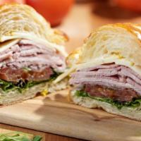 Ham & Cheese Croissant Sandwich + Salad + Soup · Muenster Cheese, Tomato, Red Onion, Romaine, Mayo, Ham. Includes Salad and Choice of Tomato ...