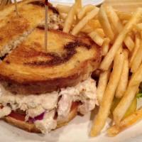 Tuna Melt Sandwich · Tuna salad served on grilled marble rye bread, sliced tomato, bacon and melted cheddar.
