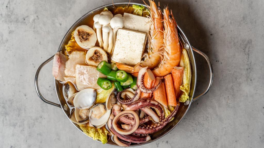 Japanese Seafood Hot Pot · Shrimp, frozen tofu, squid, fish fillet, Chinese cabbage, dams, mushrooms, fish balls, okra, green onions, crab sticks.