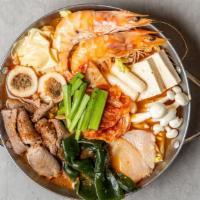 Korean Kimchi Hot Pot · Kimchi, rice cake, steak, seaweed knot, dried bean curd sticks, fish tofu, tofu, taro, leeks...