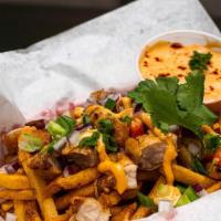 Pork Belly Fries · French fries with pork belly, Thai chilies. Served with creamy sriracha sauce.