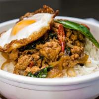 Spicy Basil Rice Bowl · Spicy. Ground chicken with bell pepper, onion, authentic basil sauce, topped with a fried eg...