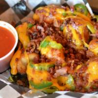 Loaded Garlic Knots · Covered In Cheddar Cheese, Bacon And Jalapenos Served With House Marinara Sauce