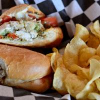Paducah Pesto & Chicken Sandwich · Chicken - pesto - tomato - roasted red pepper - mozzarella served with house kettle chips.