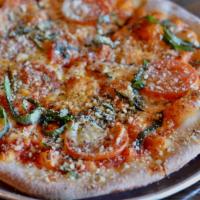 Man O' War Pizza · Tomato sauce - buffalo mozzarella - fresh tomatoes - basil.