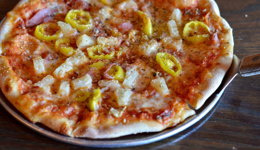Unbridled Pizza · Tomato sauce - ham - pineapple - banana pepper - mozzarella.