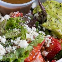 Strawberry Fields Salad · Mixed greens, strawberries mixed with goat cheese crumbles, diced tomatoes, pecans, avocado,...