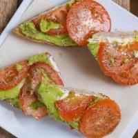 Avocado Toast · With avocado, sliced tomato, choice of goat's cheese or cream cheese, topped with seasonings.