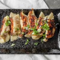 Gyoza · Chef kondo's homemade potsticker with mix of quality pork and vegetables made fresh every day.