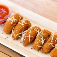 Fried Cheese · Mozzarella cheese lightly battered and fried. Sprinkled with parmigiano cheese. Served with ...