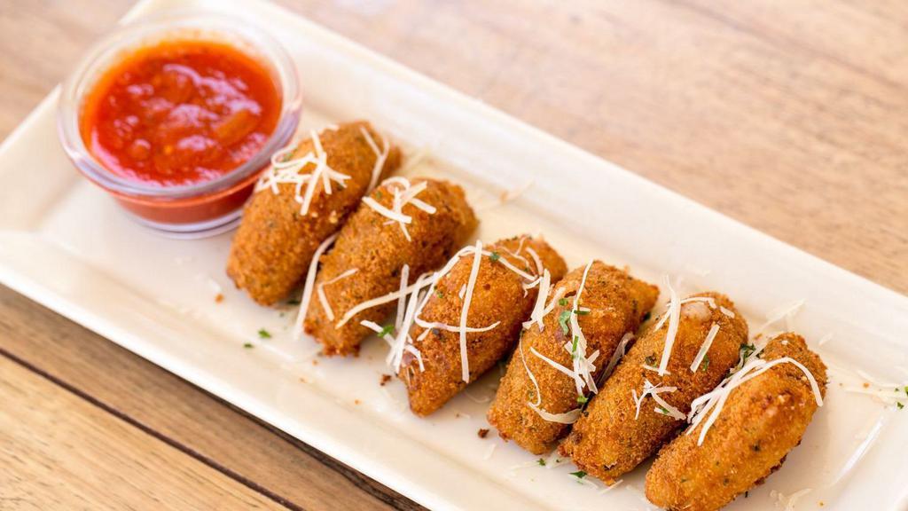 Fried Cheese · Mozzarella cheese lightly battered and fried. Sprinkled with parmigiano cheese. Served with marinara and ranch.