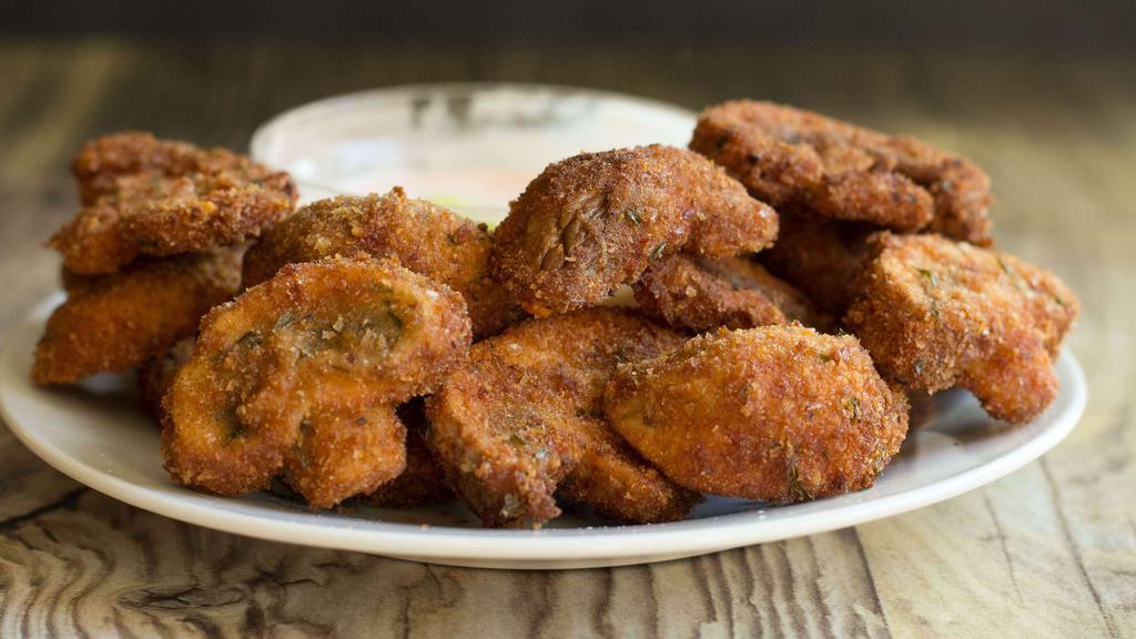 Fried Mushrooms · Fresh mushrooms breaded and fried to a golden brown. Served with marinara and ranch.