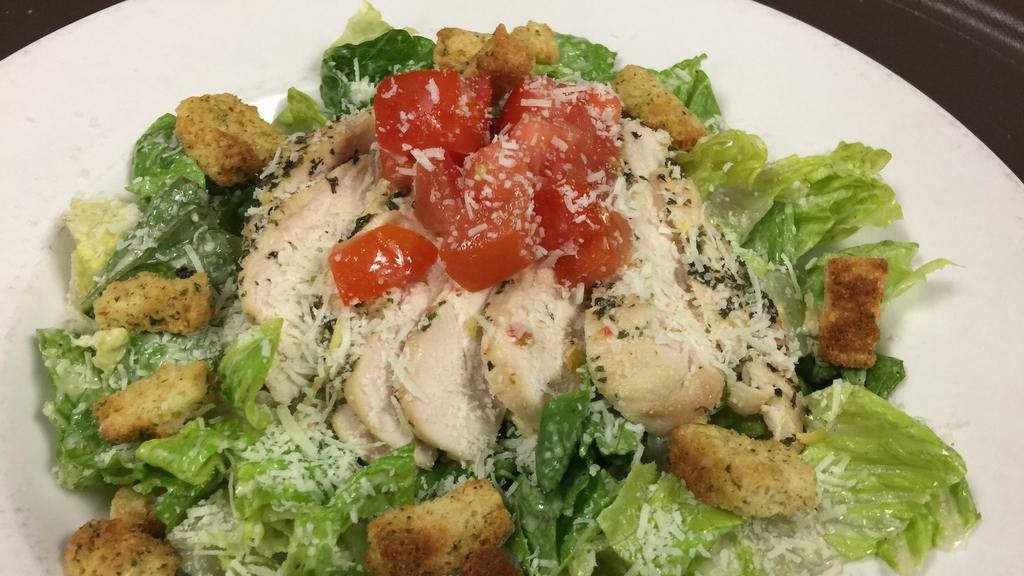 Chicken Caesar Salad · Gluten Free. Grilled chicken, tomatoes, and pecorino cheese tossed with romaine lettuce in our creamy Caesar dressing.