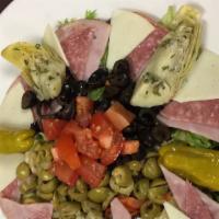 Antipasto Salad · A deluxe Italian salad with Genoa salami, artichoke hearts, ham, provolone, tomatoes, black ...