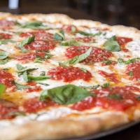 Margherita · The original queens pizza made with fresh mozzarella, diced tomatoes and fresh basil drizzle...