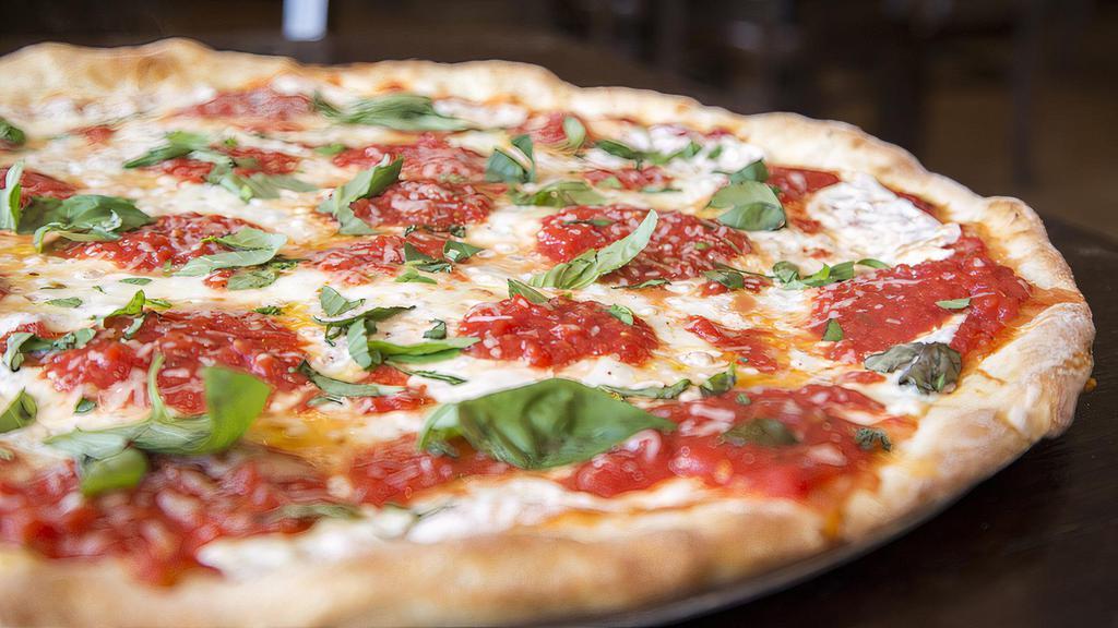 Margherita · The original queens pizza made with fresh mozzarella, diced tomatoes and fresh basil drizzled with extra virgin olive oil.