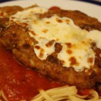Chicken Parmigiana · Lightly breaded chicken breast baked in marinara sauce and mozzarella cheese. Served with a ...