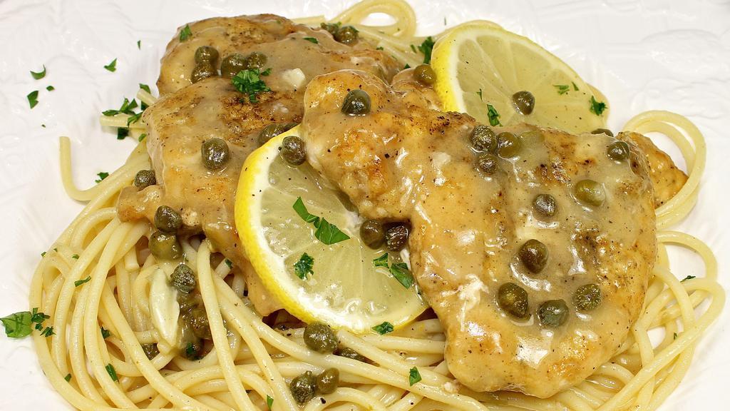 Chicken Piccata · Chicken breast, capers, mushrooms and onions sautéed in olive oil, white wine and lemons. Served with a side of spaghetti.