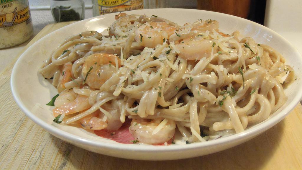 Fruta Di Mare · Tender crab, shrimp and clams sautéed in a seafood cream sauce and tossed with fettuccine.