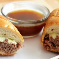 French Dip · Lean roast beef topped with melted provolone, served with au jus.