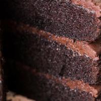 Giant Chocolate Cake · This chocolate lover's fantasy is one of our most decadent desserts! Four gigantic layers of...