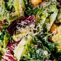 Caesar Salad · Romaine hearts, radicchio, grana padano, herbed croutons.