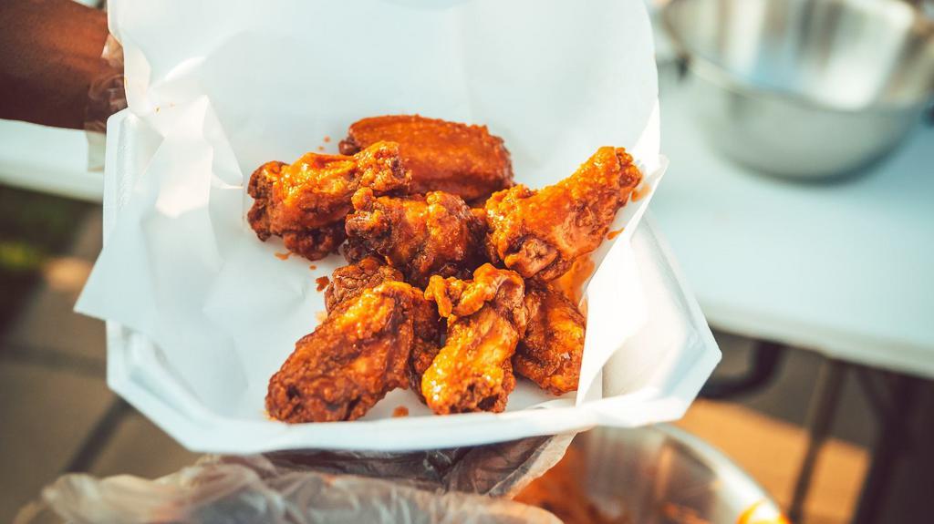 10 Wing Combo + Fries · 10 crispy wings with your choice of sauce or rub (Hot, Honey Hot, Lemon Pepper, Spicy BBQ