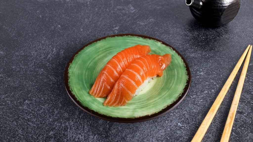 Salmon Nigiri · Slice of salmon. (2 Pieces).