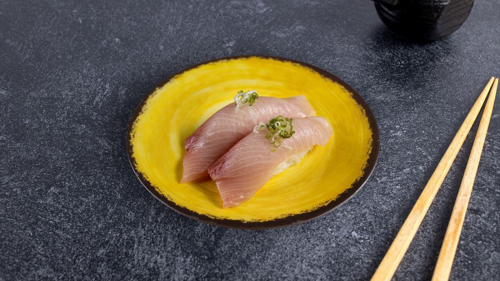 White Tuna Nigiri · Slice of white tuna over rice. (2 Pieces).