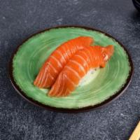 Smoked Salmon Nigiri · Slice of smoked salmon over rice. (2 Pieces)
