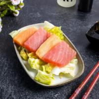 Tuna Sashimi · 8 pieces tuna sashimi.