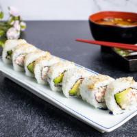 California Roll · Imitation crab, avocado, and cucumber inside with smelt eggs on top.