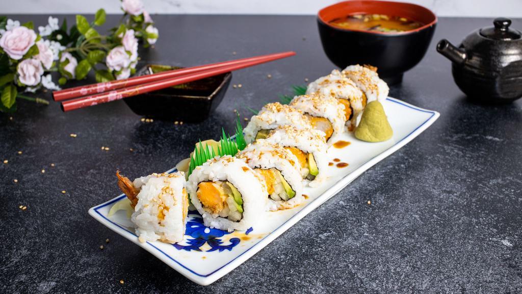 Crunchy Shrimp Roll · Shrimp tempura, avocado, cucumber, and spicy mayonnaise inside with tempura flakes and eel sauce on top.