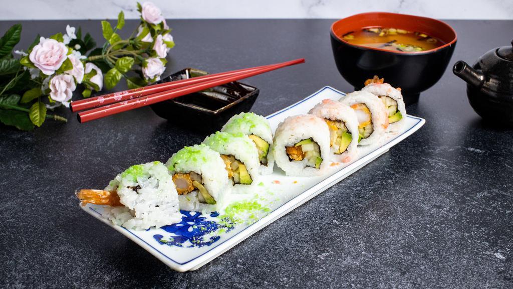 Arigato Roll · Shrimp tempura, spicy tuna, avocado, cucumber, and masago inside with eel sauce on top.