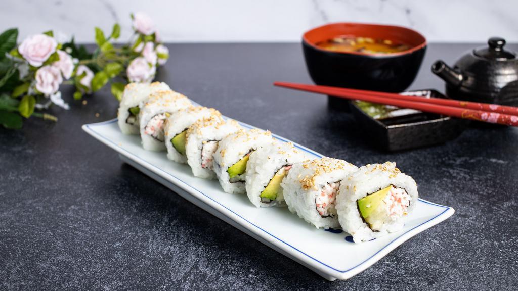 Baked Salmon Roll · California roll with salmon on top and baked in oven.