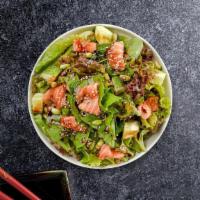 Salmon Salad · Mixed greens, smoked salmon, edamame, and cucumbers tossed with Asian dressing.