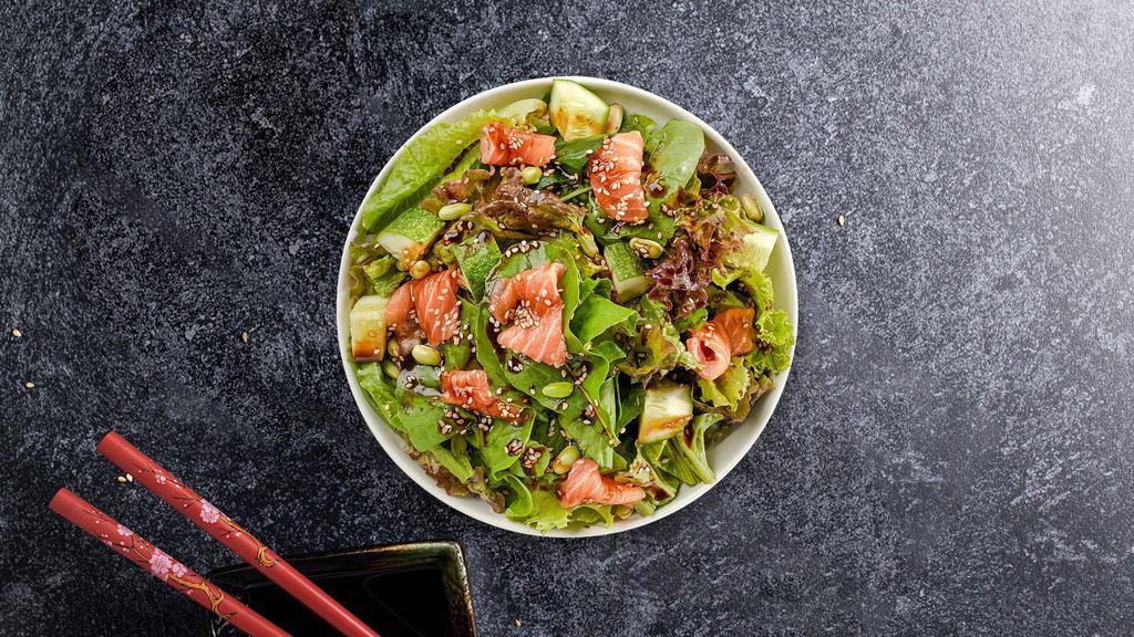 Salmon Salad · Mixed greens, smoked salmon, edamame, and cucumbers tossed with Asian dressing.