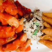Sweet & Sour Combination · Pork fried rice, fried shrimp, sweet and sour chicken.