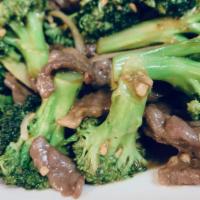 Beef Broccoli · Sliced marinated beef stir fried with fresh garden broccoli in dark seasoned sauce.