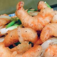 Salt & Pepper Shrimp · Hot and spicy. Large deep-fried prawns tossed with jalapenos, onions, green onions, and savo...