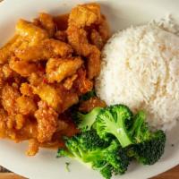 Orange Chicken · Lightly battered chicken coated in a tangy caramelized sauce. Served with white rice, shredd...