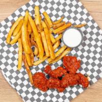 2 Piece Buffalo Dipped Chicken Tenders · Freshly hand breaded chicken tenders dipped in buffalo sauce served with fries and choice of...