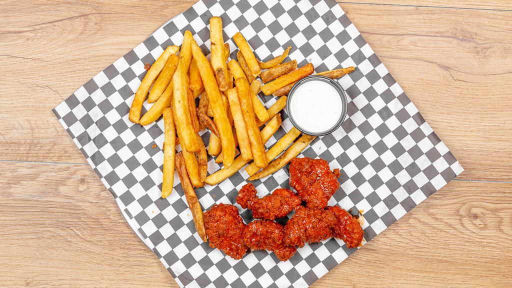 2 Piece Buffalo Dipped Chicken Tenders · Freshly hand breaded chicken tenders dipped in buffalo sauce served with fries and choice of sauce on the side.
