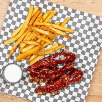 2 Piece Bbq Dipped Chicken Tenders · Freshly hand breaded chicken tenders dipped in bbq sauce served with fries and choice of sau...
