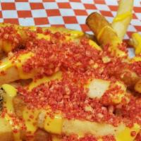 Flaming Devil Fries · French fries, melted cheese sauce, Cheetos dust.