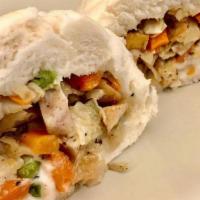 Steamed Bun (Bánh Bao) · Tofu, mix veggies, taro, beans, and vegan ham...