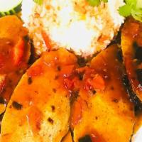 11. Stew Fish (Cá Kho) · Vegan fish fillet with stewed tomato sauce.