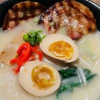 Tonkotsu Ramen (Pork Broth) · Seared pork belly, scallions, bamboo, nori, hard boiled egg, naruto maki (fish cake), Blackw...