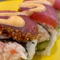 Pepper Tuna Roll · Seared tuna, crab salad, cucumber, spicy mayo, wasabi mayo.