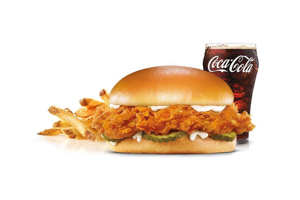 Hand-Breaded Chicken Sandwich Combo · Premium, all-white chicken fillet, hand dipped in buttermilk, lightly breaded and fried to a golden brown, garlic pickle and mayonnaise served on a potato bun. Served with Fries and a Soft Drink.